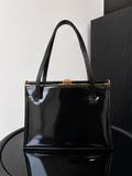Jane Shilton Black Patent Top Handle Bag