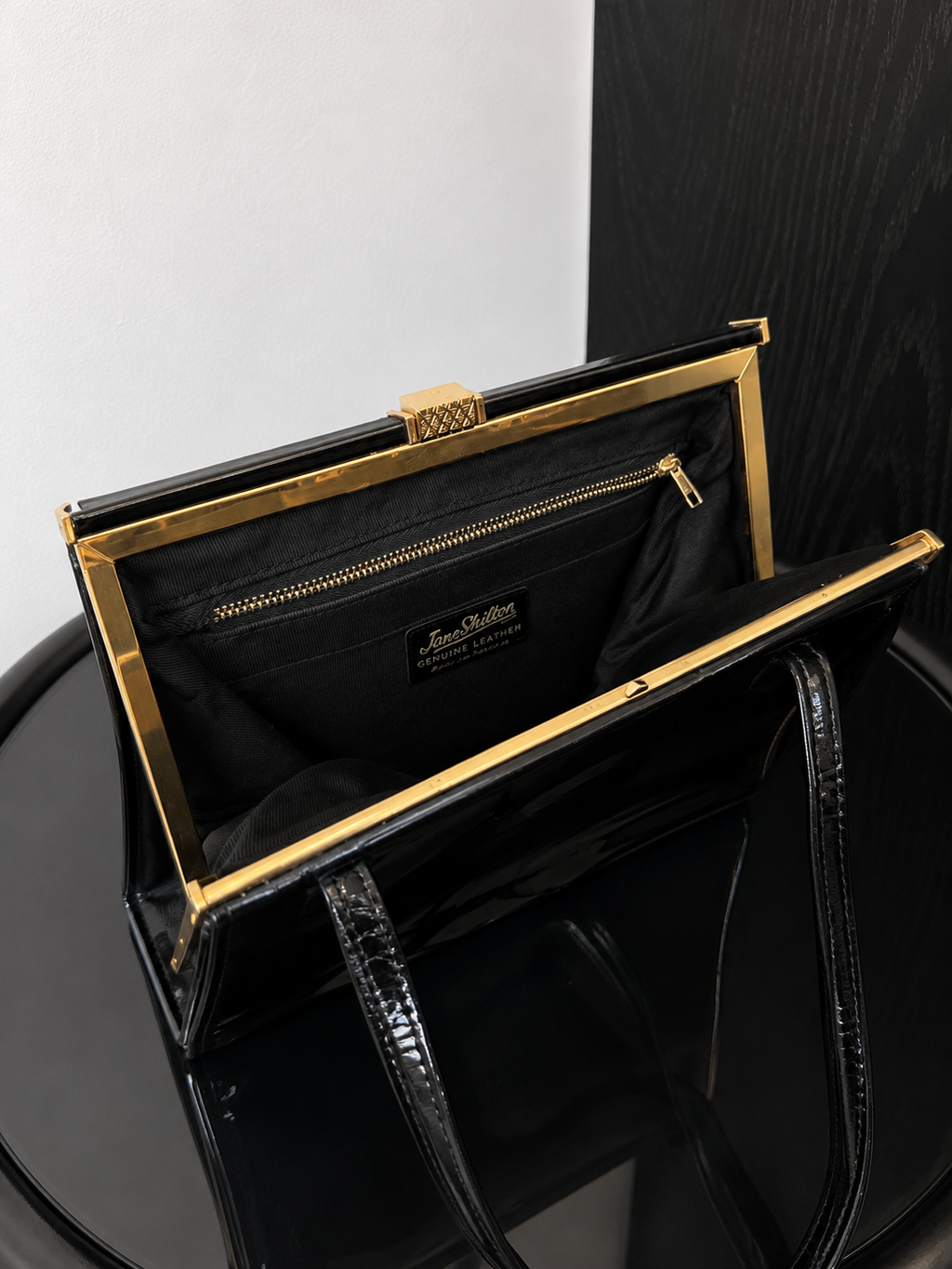 Jane Shilton Black Patent Top Handle Bag